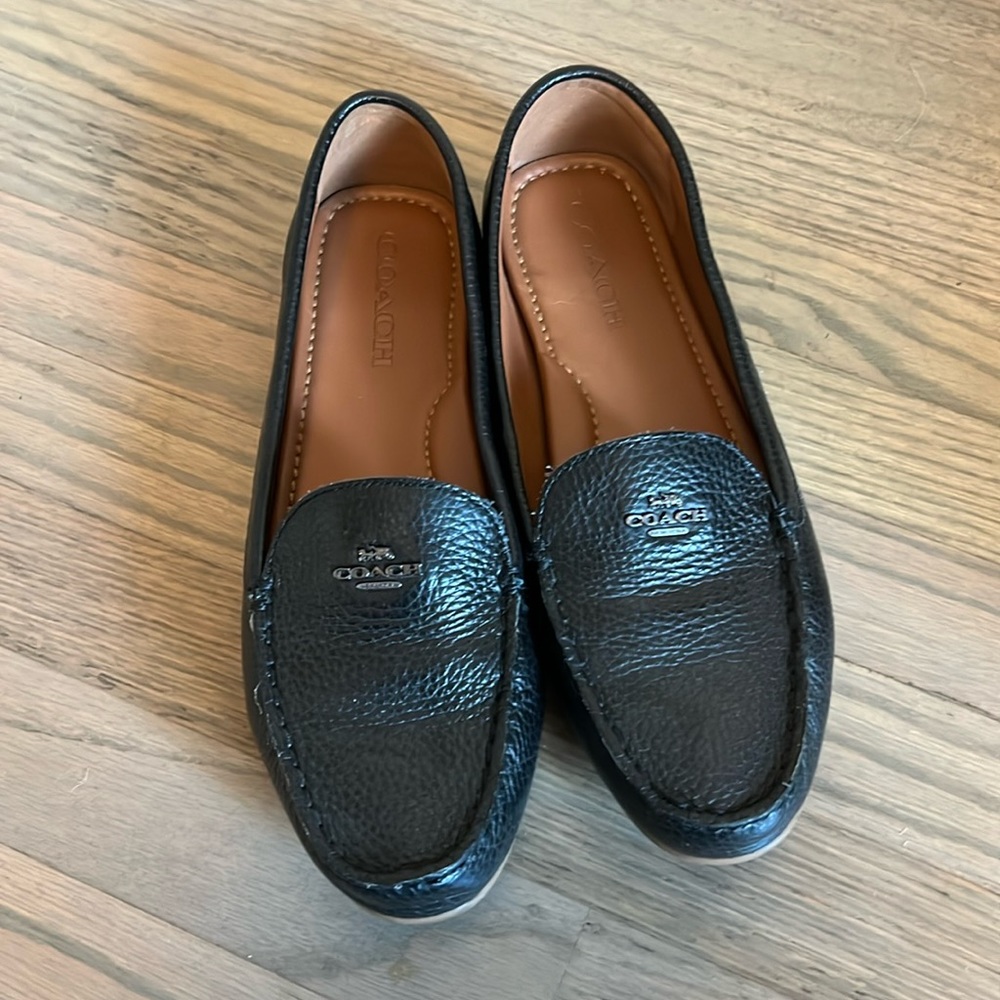 Coach black leather loafers/flats in really great condition.